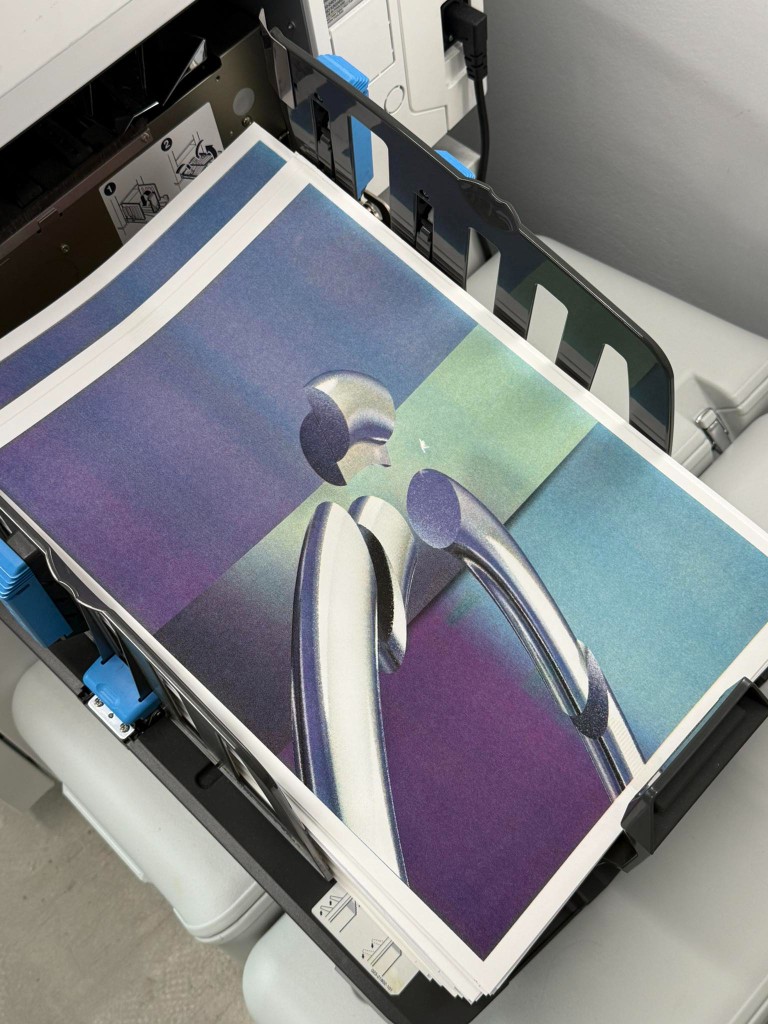 The print coming off the press